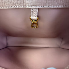 Capucines PM Microchipped