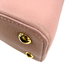 Capucines PM Microchipped