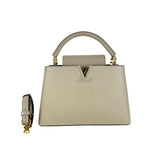 Capucines PM Microchipped