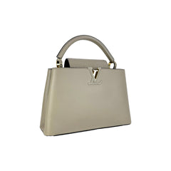 Capucines PM Microchipped