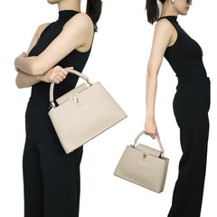 Capucines PM Microchipped